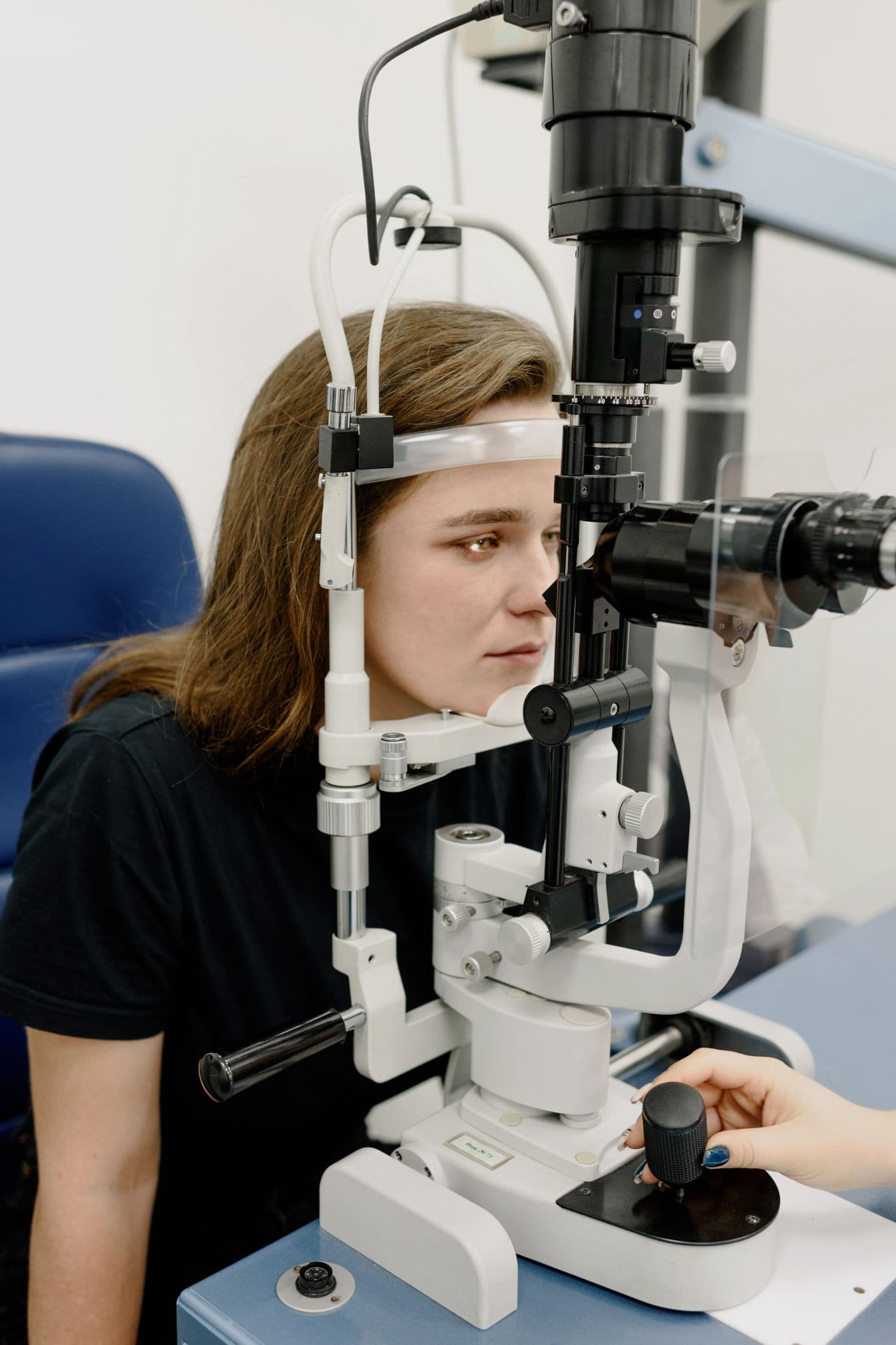 Patient receiving a detailed eye examination